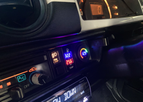 An In/Out thermometer panel and the fog lamp switch panel 08